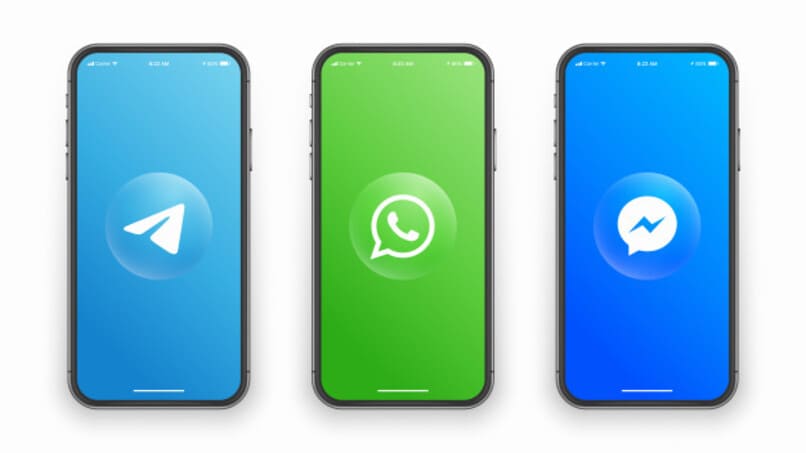logos de app de mensajeria telegram whatsapp y messenger en pantalla de movil