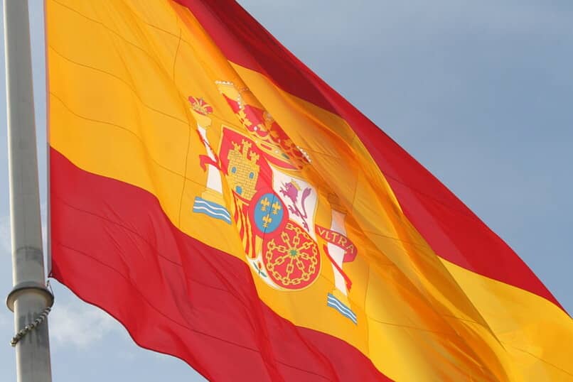 flag and coat of arms of spain