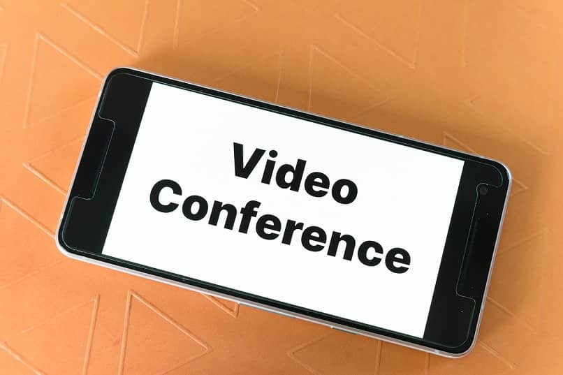 view of smartphone with screen and video conference logo