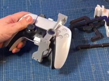 One-handed DualSense operation.  A unique gadget for the PlayStation 5 controller has been created