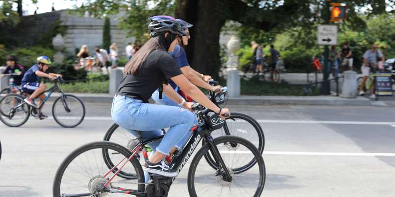 people riding bicycle