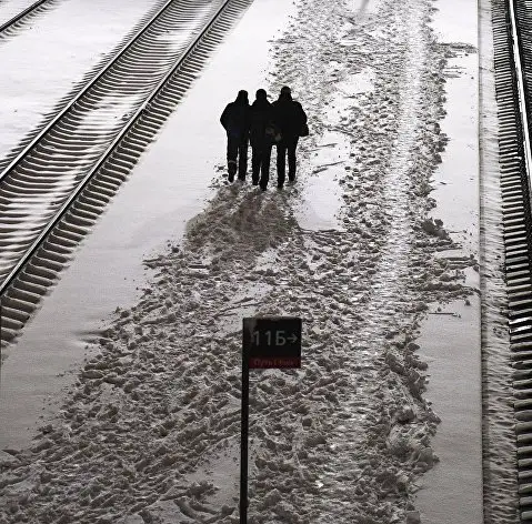 Passengers on the platform of the railway station